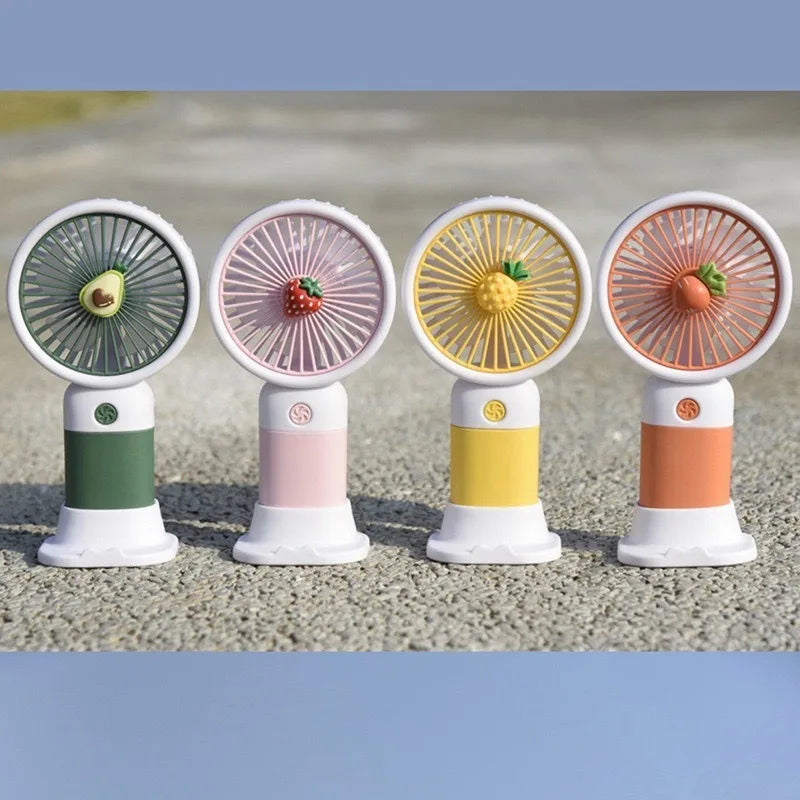 Fruit-Shaped Mini Handheld Fan – USB Rechargeable & Phone Stand Handheld Mini Fan Babs