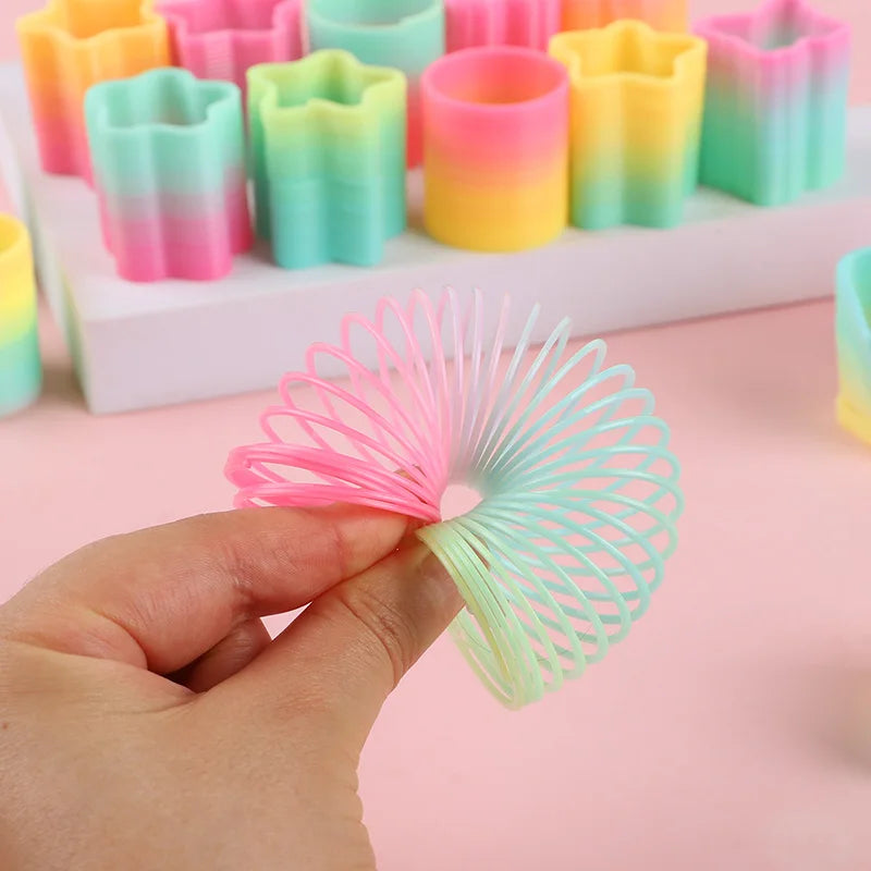 Rainbow Magic Spring Toys 12/24 Pcs – Kids Party Favors Novelty Spring Toys Babs
