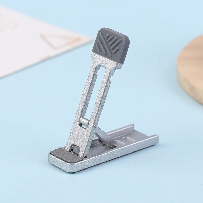 Mini Zinc Alloy Foldable Laptop Stand – Adjustable Height Riser Laptop Stand Babs