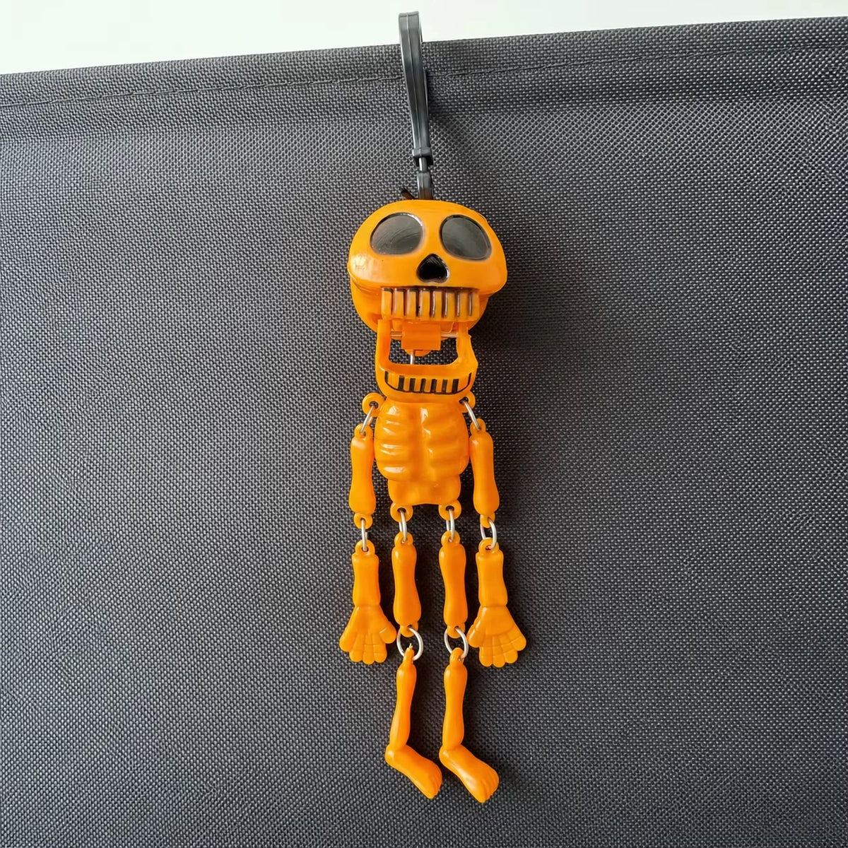 Skeleton Bag Charm Keychain – Pull String Movable Joints Novelty Keychain Charm Babs Orange